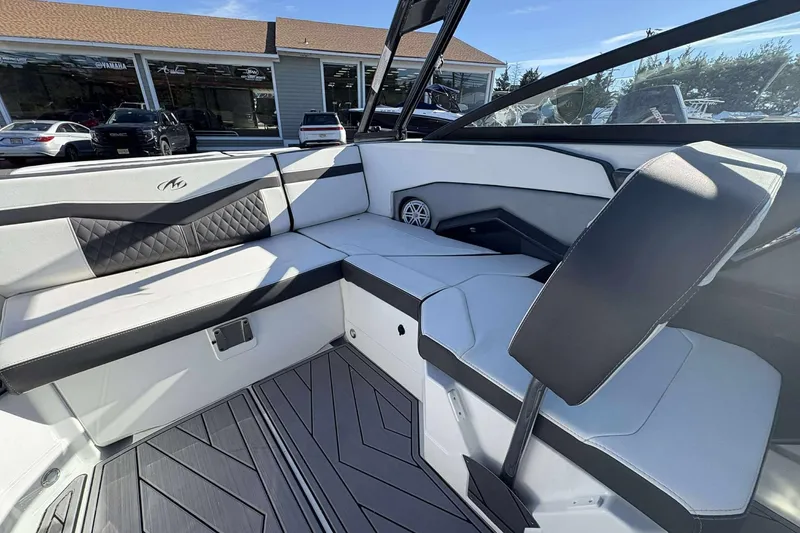 Slide: The Image of 2023 Monterey 238SS Super Sport boat interior with sleek seating and modern design. - 7