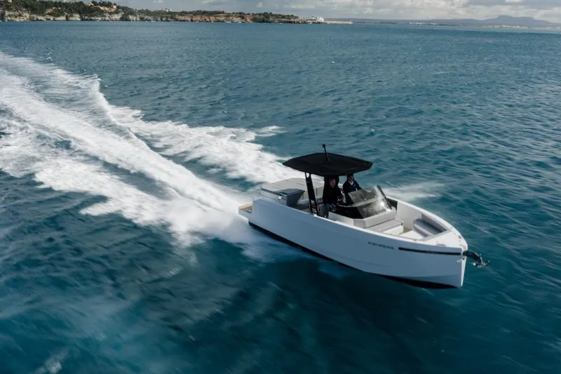 Slide: The Image of 2026 De Antonio Yachts D29 cruising on open water, showcasing sleek design and performance. - 12