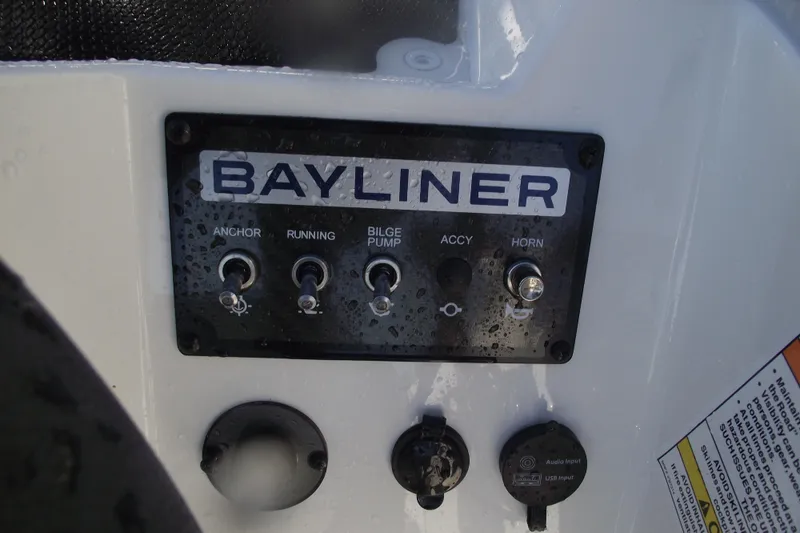 Slide: The Image of Control panel of 2026 Bayliner M19 boat with switches and inputs. - 15