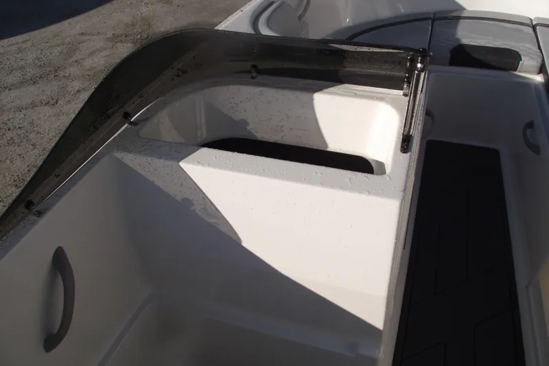 Slide: The Image of Interior view of 2026 Bayliner M19 boat, featuring sleek seating and modern design elements. - 16