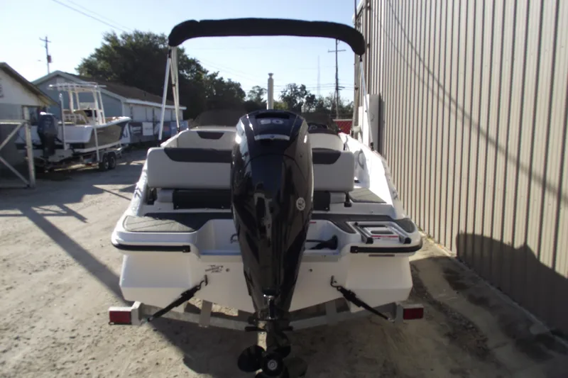 Slide: The Image of 2026 Bayliner M19 boat with outboard motor. - 3