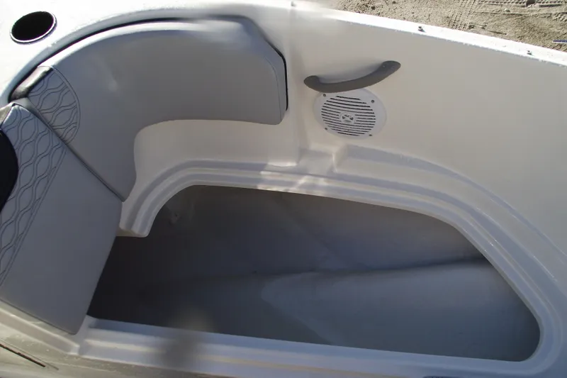 Slide: The Image of Interior seating of 2026 Bayliner M19 boat with speaker and handle. - 7