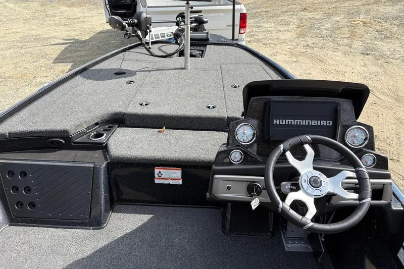 Slide: The Image of 2024 Nitro Z19 boat dashboard with Humminbird system and steering wheel. - 7