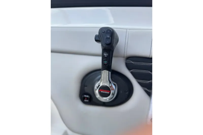 Slide: The Image of Throttle control of 2021 Sea Ray SPX 230 Outboard boat, featuring ergonomic design. - 4