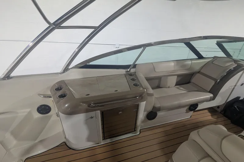Slide: The Image of 2014 Formula 350 Crossover Bowrider interior with seating and storage, featuring sleek design. - 12
