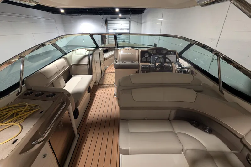 Slide: The Image of 2014 Formula 350 Crossover Bowrider interior with luxurious seating and modern dashboard. - 16