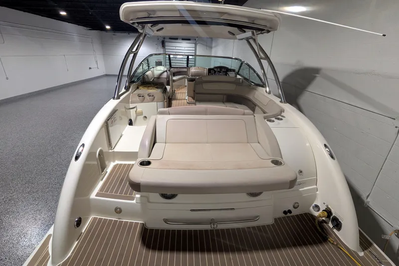 Slide: The Image of 2014 Formula 350 Crossover Bowrider in a spacious indoor showroom. - 17