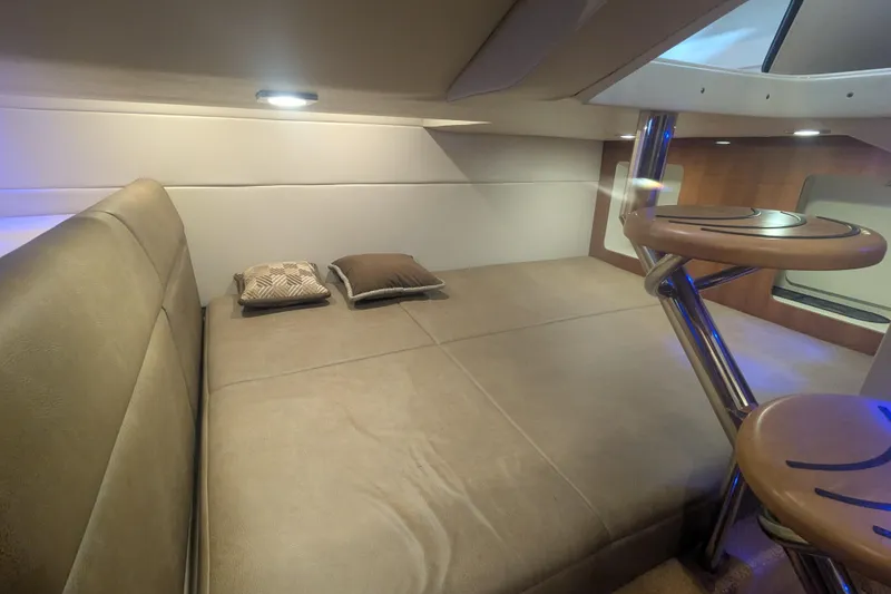 Slide: The Image of 2014 Formula 350 Crossover Bowrider cabin interior with cozy seating and modern design. - 22