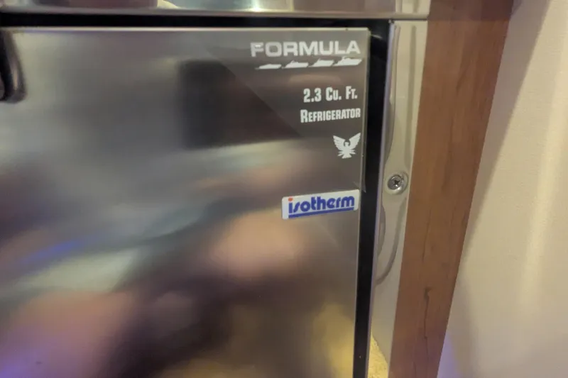 Slide: The Image of 2014 Formula 350 Crossover Bowrider, 2.3 cu. ft. Isotherm refrigerator detail. - 26