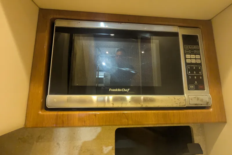 Slide: The Image of Built-in Franklin Chef microwave in 2014 Formula 350 Crossover Bowrider. - 27