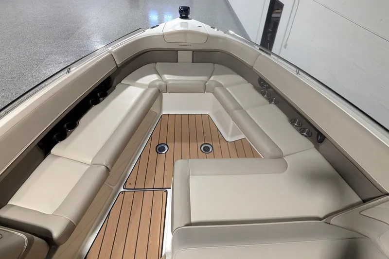Slide: The Image of 2014 Formula 350 Crossover Bowrider with spacious seating and teak flooring. - 31