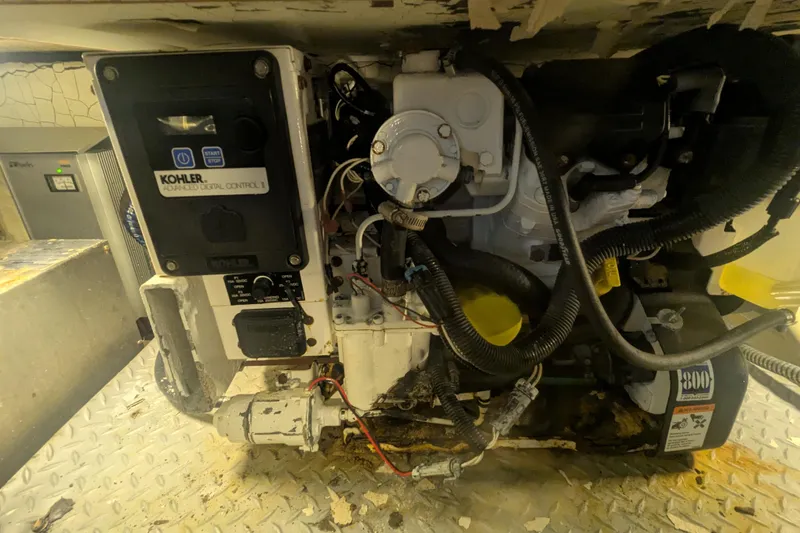 Slide: The Image of Engine compartment of a 2014 Formula 350 Crossover Bowrider with Kohler digital control panel. - 38