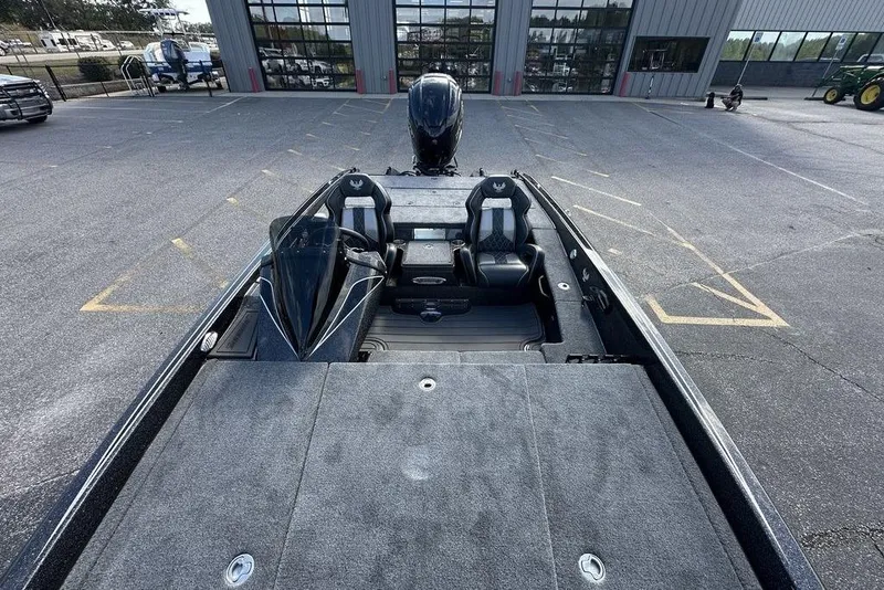 Slide: The Image of 2026 Phoenix 920 Elite X boat with sleek design and spacious seating. - 9