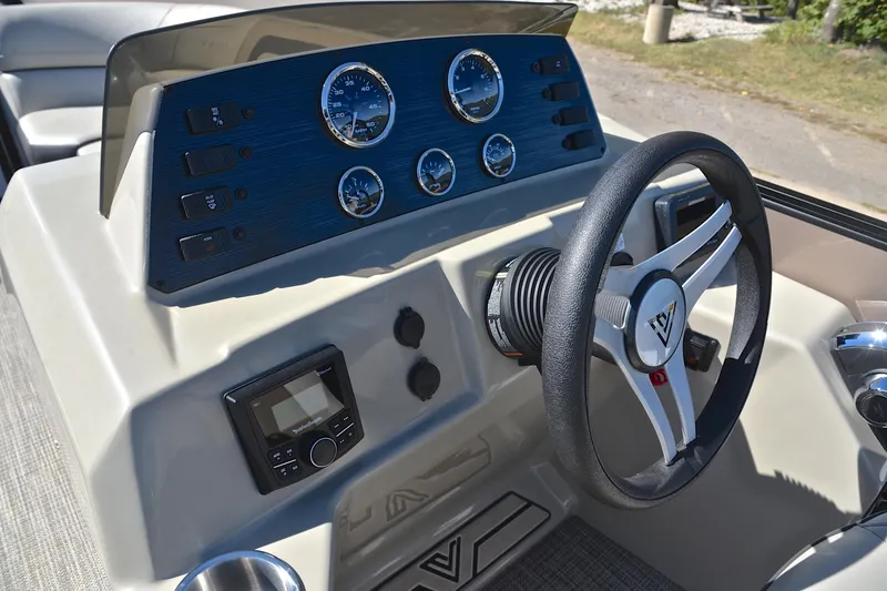 Slide: The Image of 2023 Viaggio Lago 22 R dashboard with steering wheel and instrument panel. - 27