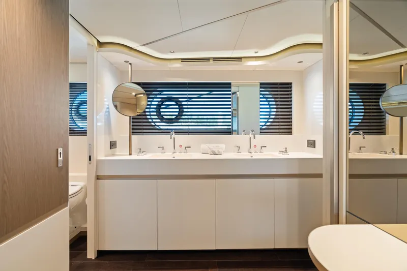 Slide: The Image of Luxurious bathroom interior of 2022 Azimut Magellano 25 Metri yacht, featuring modern design and fixtures. - 11
