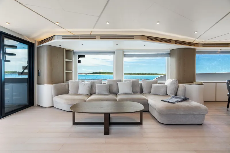 Slide: The Image of Luxurious interior of 2022 Azimut Magellano 25 Metri yacht with modern seating and ocean view. - 16
