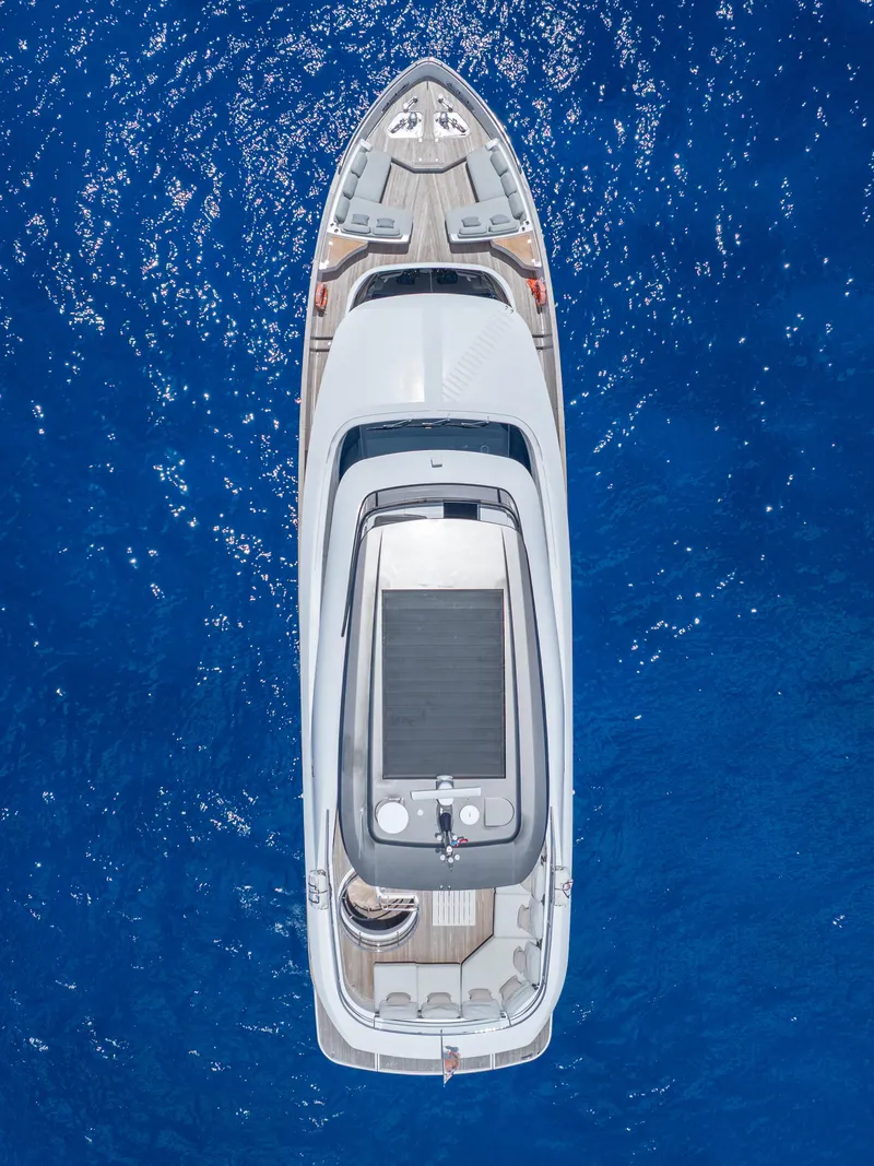 Slide: The Image of Aerial view of 2022 Azimut Magellano 25 Metri yacht on blue ocean water. - 2