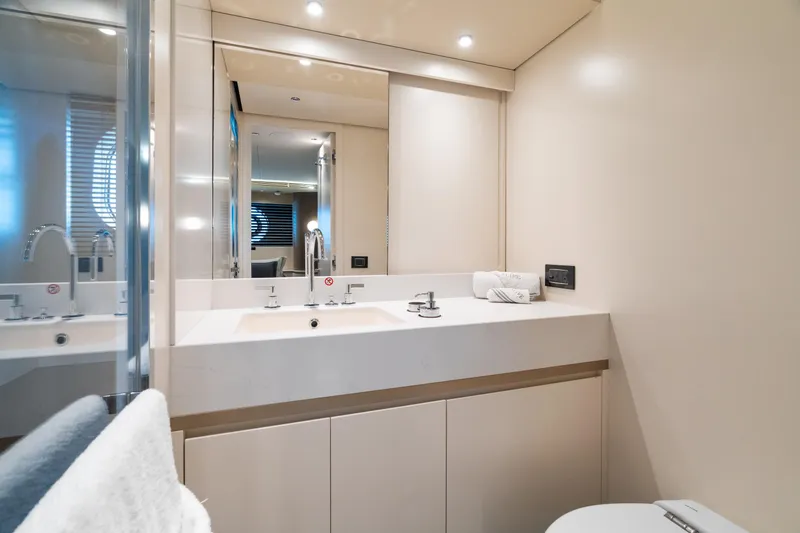 Slide: The Image of Luxurious bathroom interior of 2022 Azimut Magellano 25 Metri yacht, featuring modern fixtures. - 8