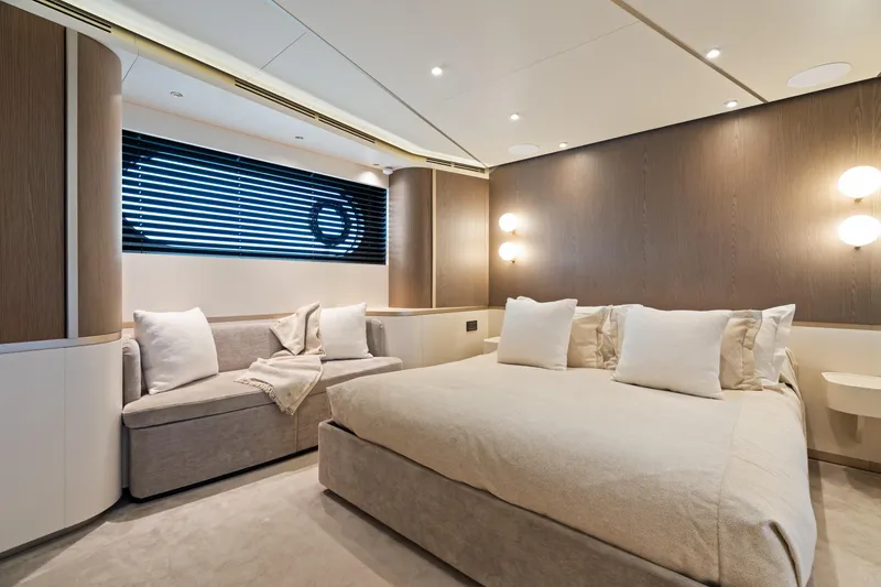 Slide: The Image of Luxurious bedroom interior on 2022 Azimut Magellano 25 Metri yacht, featuring modern design and cozy ambiance. - 9