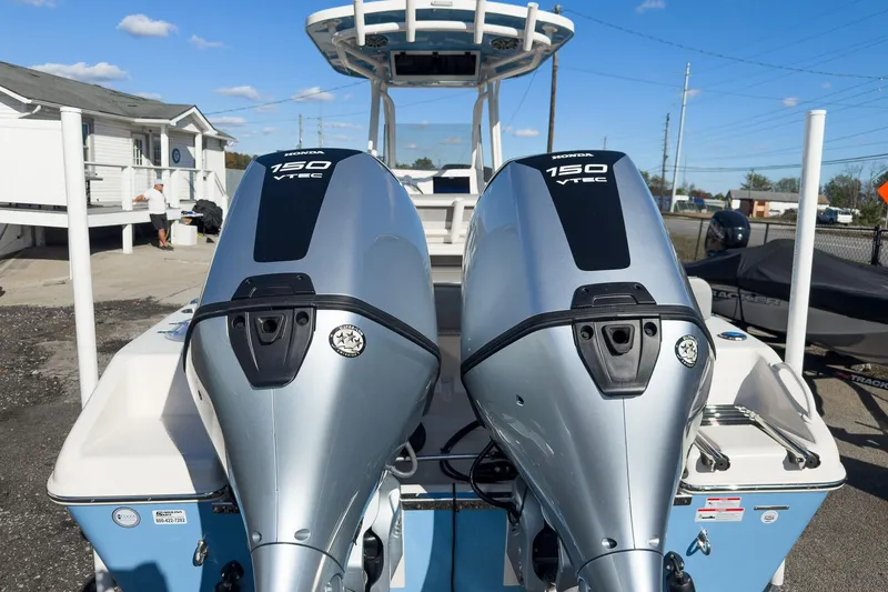 Slide: The Image of 2026 Sea Chaser 24 HFC DE with dual Honda 150 VTEC outboard engines. - 22