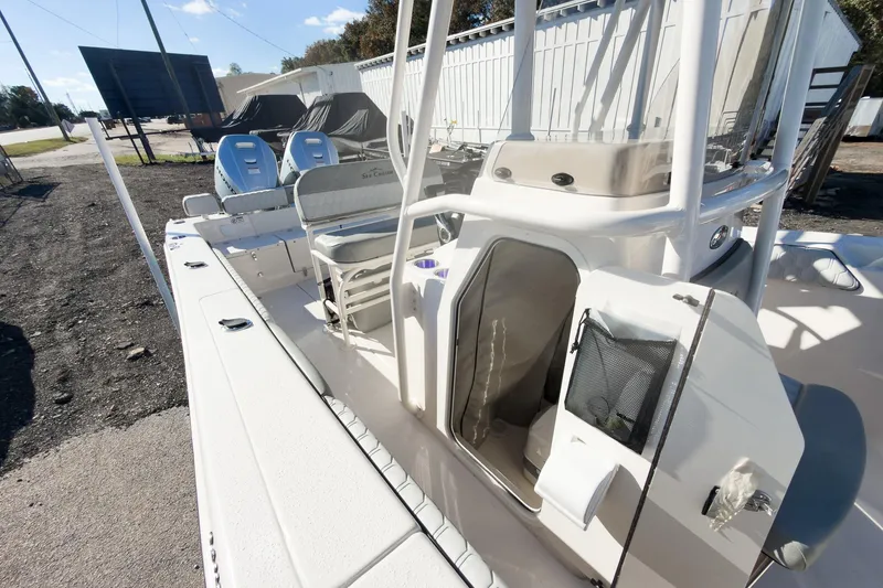 Slide: The Image of 2026 Sea Chaser 24 HFC DE boat interior with seating and storage compartments. - 35