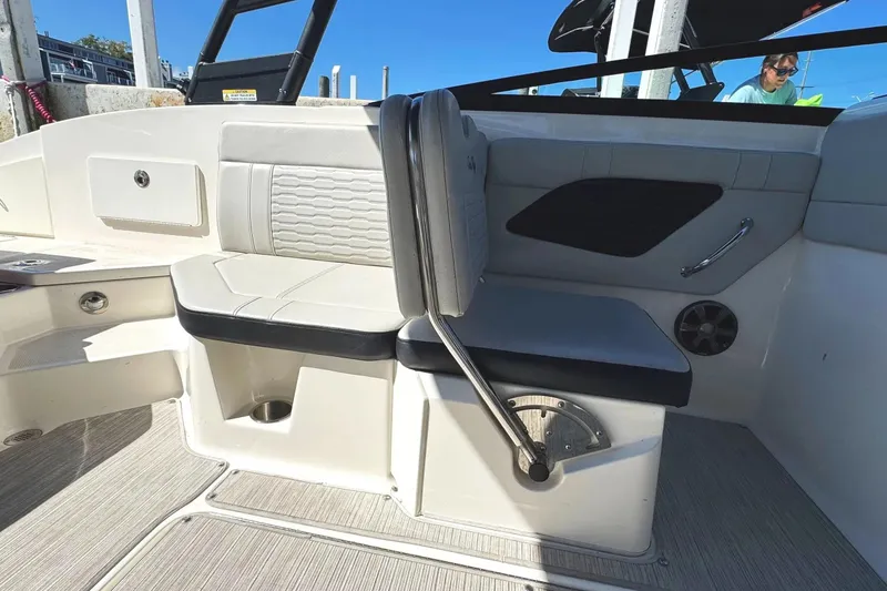 Slide: The Image of 2021 Sea Ray SPX 230 Outboard interior seating with modern design and comfortable upholstery. - 16