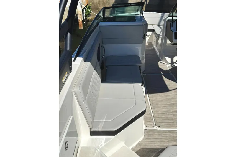 Slide: The Image of 2021 Sea Ray SPX 230 Outboard interior seating area with modern design and comfortable upholstery. - 17