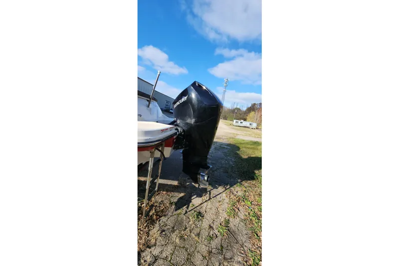 Slide: The Image of 2021 Sea Ray SPX 230 Outboard with Mercury engine in outdoor setting. - 30