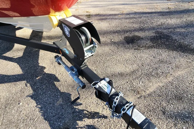 Slide: The Image of Trailer hitch of 2021 Sea Ray SPX 230 Outboard on asphalt surface. - 31