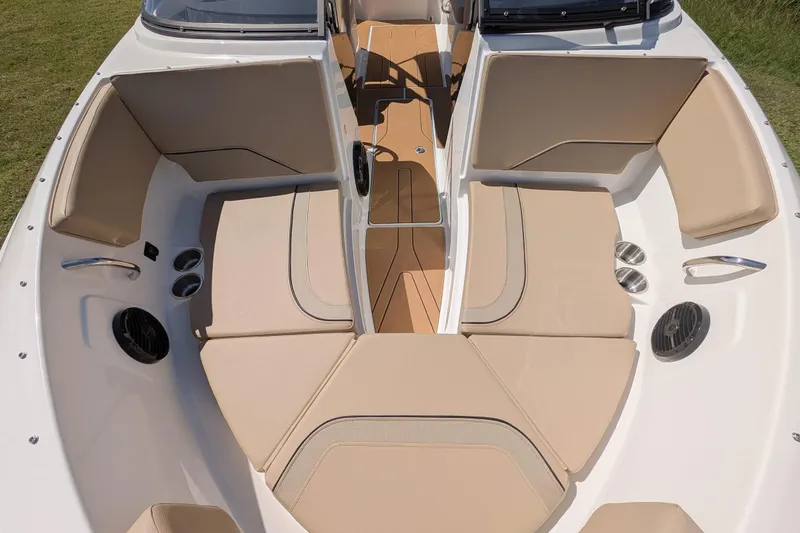 Slide: The Image of 2026 Bayliner V20 boat interior with beige seating and modern design. - 10