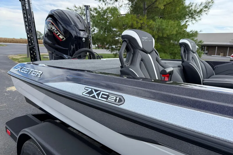 Slide: The Image of 2026 Skeeter ZXE21 boat with sleek design and modern seating. - 12