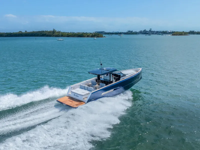 Slide: The Image of 2022 Fjord 44 Open yacht cruising on a sunny day in open waters. - 16