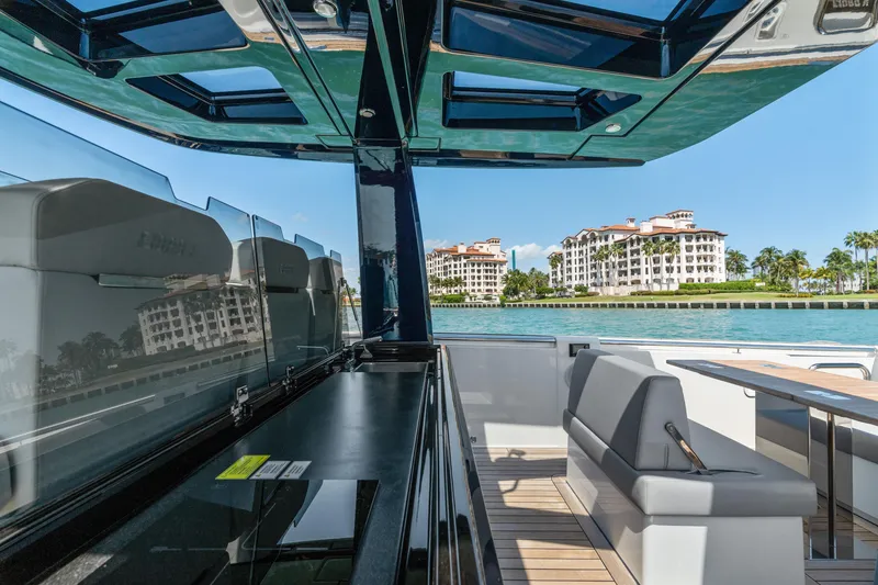 Slide: The Image of Luxurious 2022 Fjord 44 Open yacht interior with waterfront view and modern seating. - 20