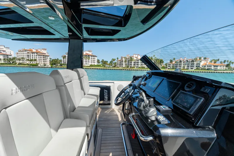Slide: The Image of 2022 Fjord 44 Open yacht interior with modern helm and luxurious seating. - 30