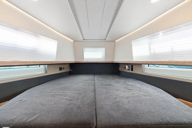 Slide: The Image of Interior cabin of 2022 Fjord 44 Open yacht, featuring a spacious bed and modern design. - 43