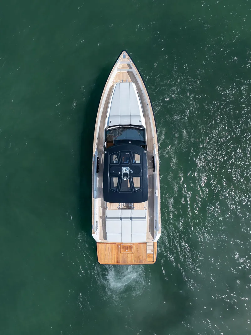 Slide: The Image of Aerial view of 2022 Fjord 44 Open yacht cruising on the water. - 6