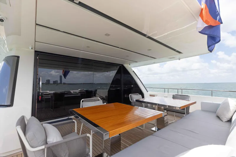 Slide: The Image of Luxurious 2022 Sanlorenzo SL86 yacht deck with elegant seating and ocean view. - 28