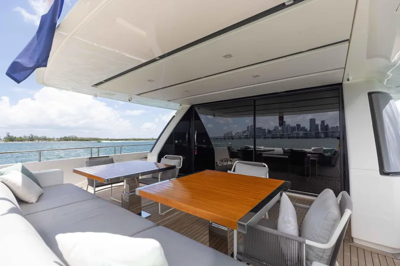 Slide: The Image of Luxurious 2022 Sanlorenzo SL86 yacht deck with modern seating and ocean view. - 30