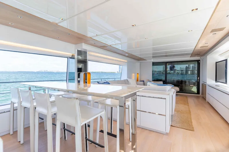 Slide: The Image of Luxurious interior of 2022 Sanlorenzo SL86 yacht with modern dining area and ocean view. - 36