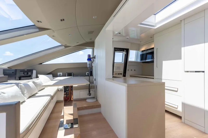 Slide: The Image of Luxurious interior of 2022 Sanlorenzo SL86 yacht with modern kitchen and seating area. - 38