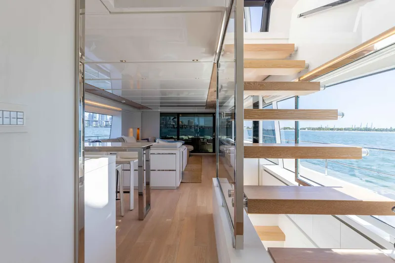 Slide: The Image of Luxurious interior of 2022 Sanlorenzo SL86 yacht with modern staircase and ocean view. - 41
