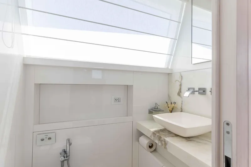 Slide: The Image of Luxurious bathroom in 2022 Sanlorenzo SL86 yacht with modern fixtures and natural light. - 42