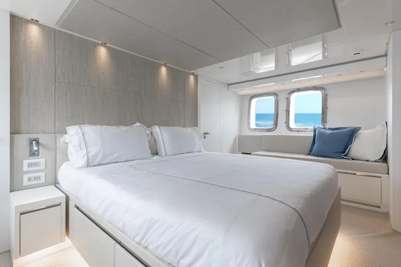 Slide: The Image of Luxurious bedroom interior of 2022 Sanlorenzo SL86 yacht with ocean view windows. - 45
