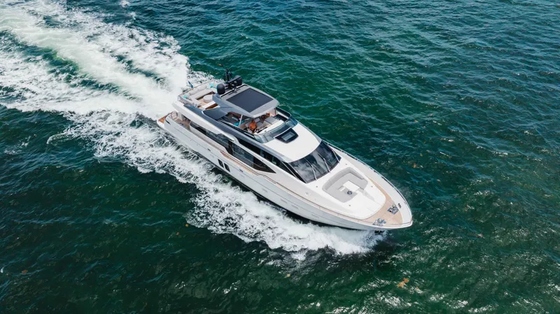 Slide: The Image of Sanlorenzo SL86 2022 yacht cruising on open water, aerial view. - 6