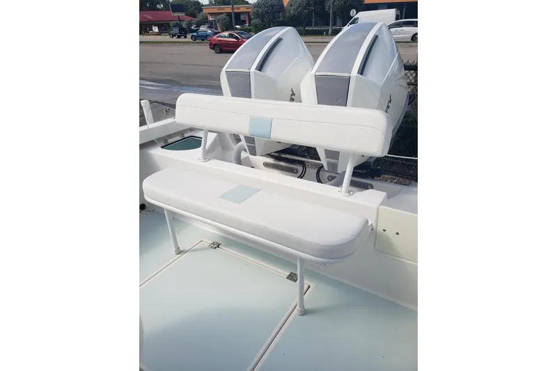 Slide: The Image of 2022 Albury Brothers 27 boat with dual engines and white seating. - 19