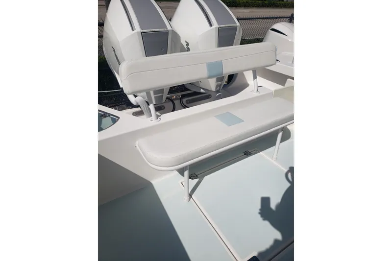 Slide: The Image of 2022 Albury Brothers 27 boat with dual engines and cushioned seating. - 25
