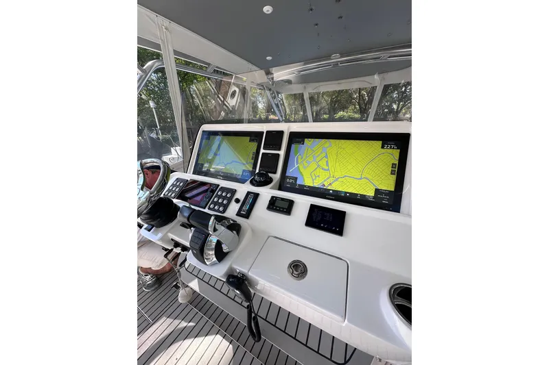 Slide: The Image of Cockpit of 2020 Intrepid 409 Valor with navigation screens and controls. - 18