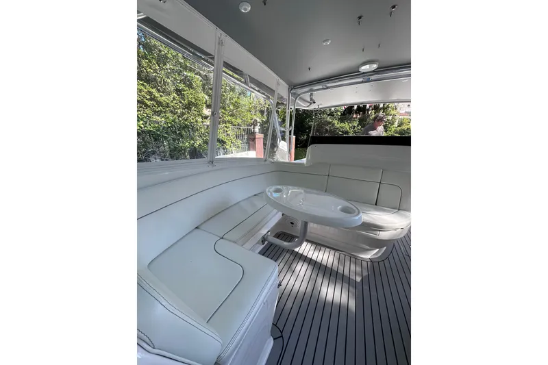 Slide: The Image of Luxurious interior of 2020 Intrepid 409 Valor boat with sleek seating and table. - 35