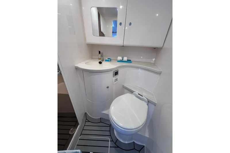 Slide: The Image of 2020 Intrepid 409 Valor boat bathroom with modern fixtures and sleek design. - 42
