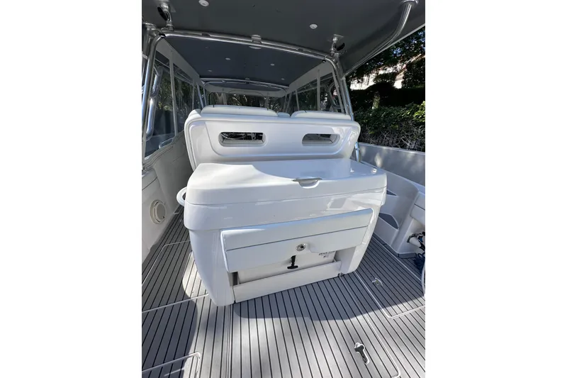Slide: The Image of 2020 Intrepid 409 Valor boat interior with sleek seating and modern design. - 53